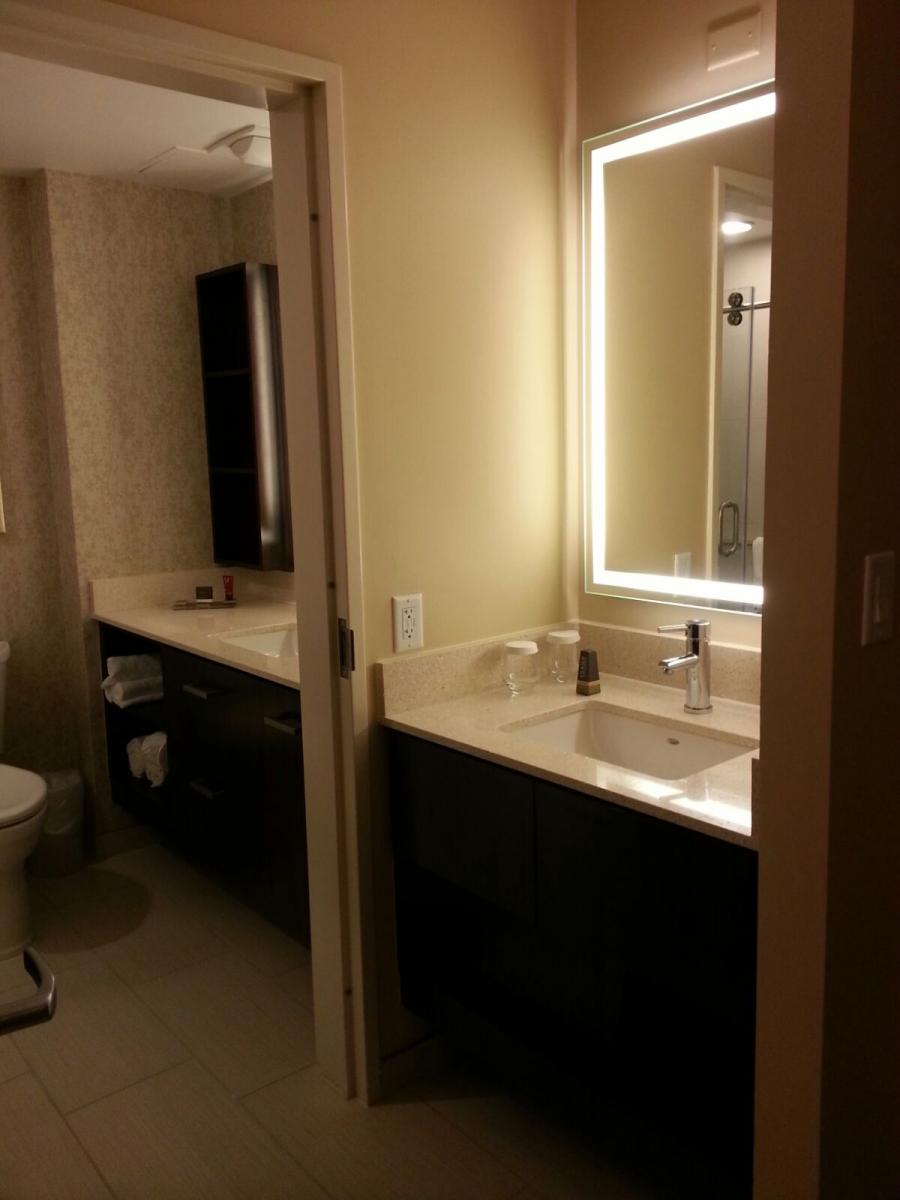 MD Anderson Rotary House International Hotel bathroom with 2 sinks